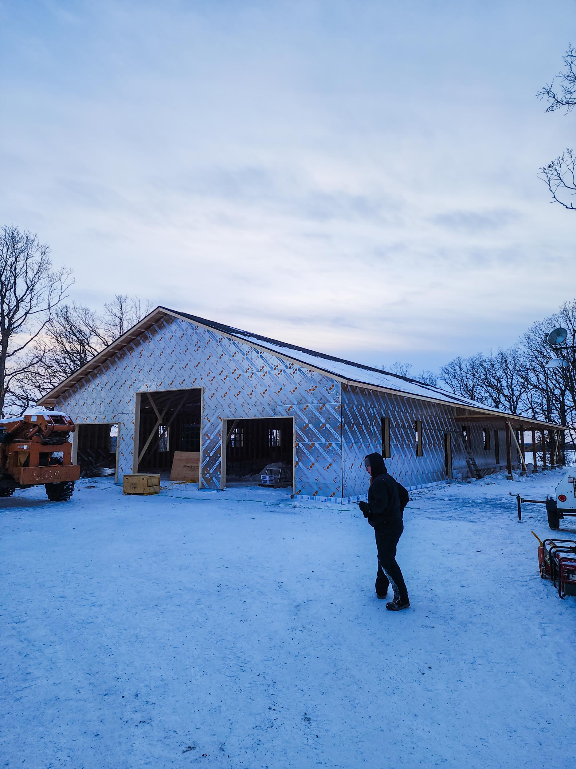 Exterior finishing on a house shell in Southern Manitoba